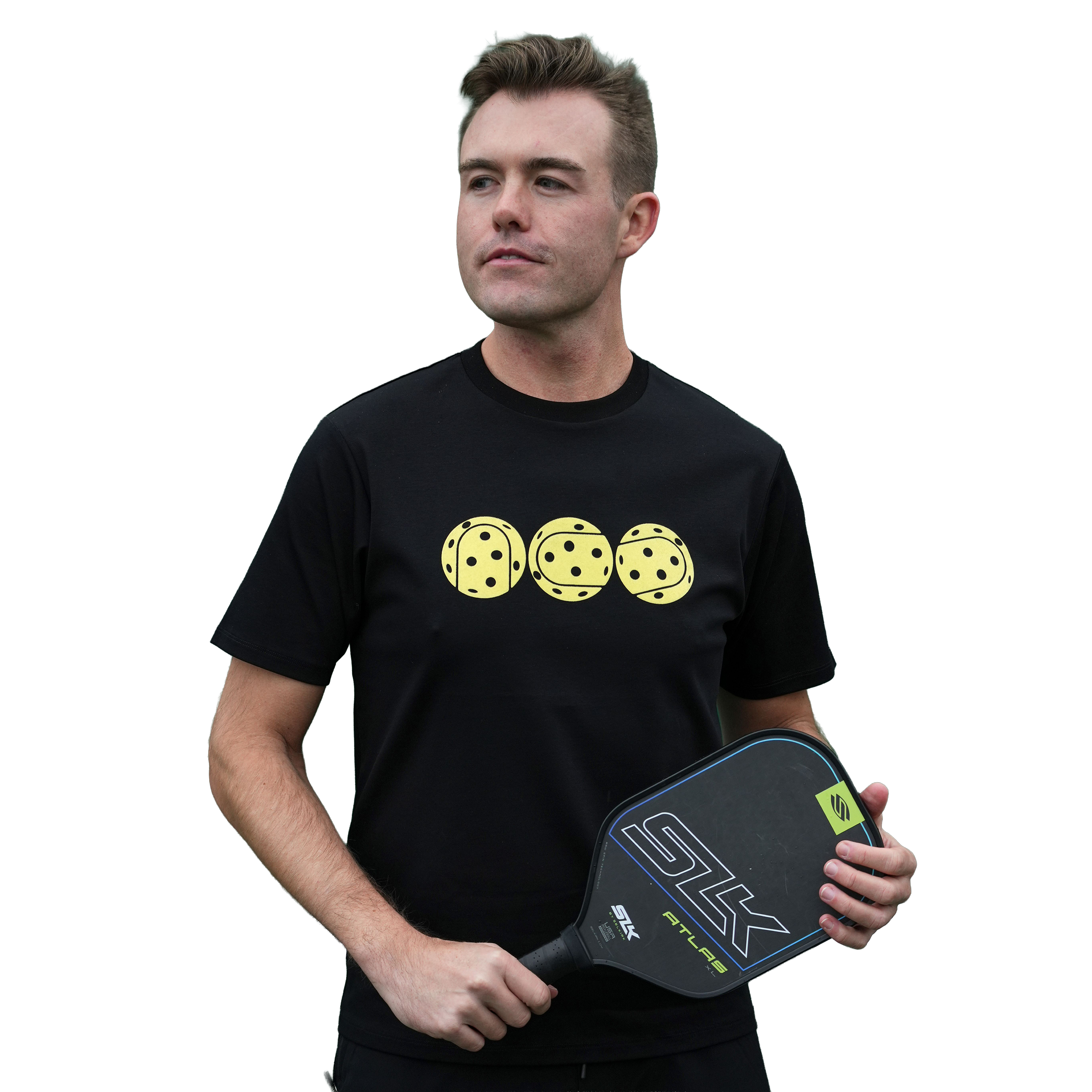 Premium cotton men's tee with playful graphic, worn by a man holding a pickleball paddle.